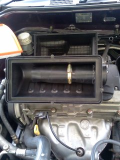 Photo: Twin Surbo installed in the air  filter outlet of the Proton Exora